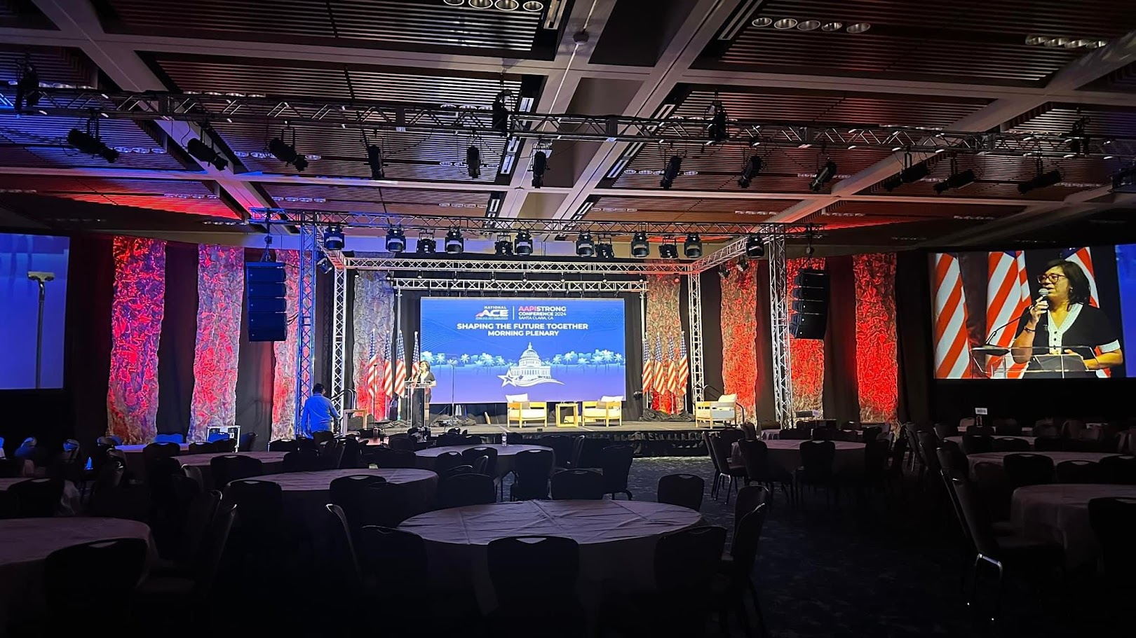 National ACE conference main stage — line-array, lighting truss, LED wall and IMAG screens