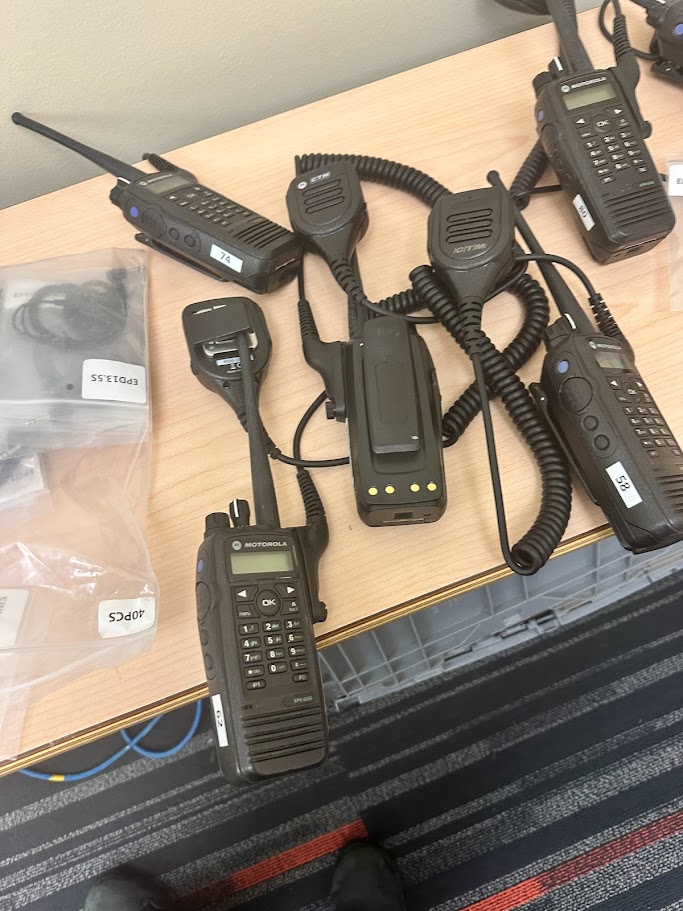 Analog and digital handheld two-way radios with surveillance earpieces and speaker mics